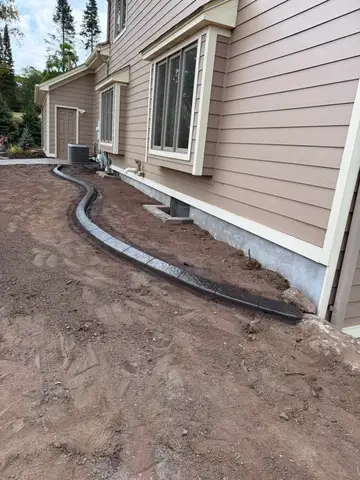 Concrete edging along grassy area in Princeton, MN